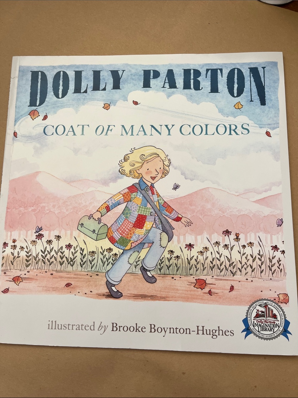 Free with $25 purchase Dolly Parton Coat of Many Colors